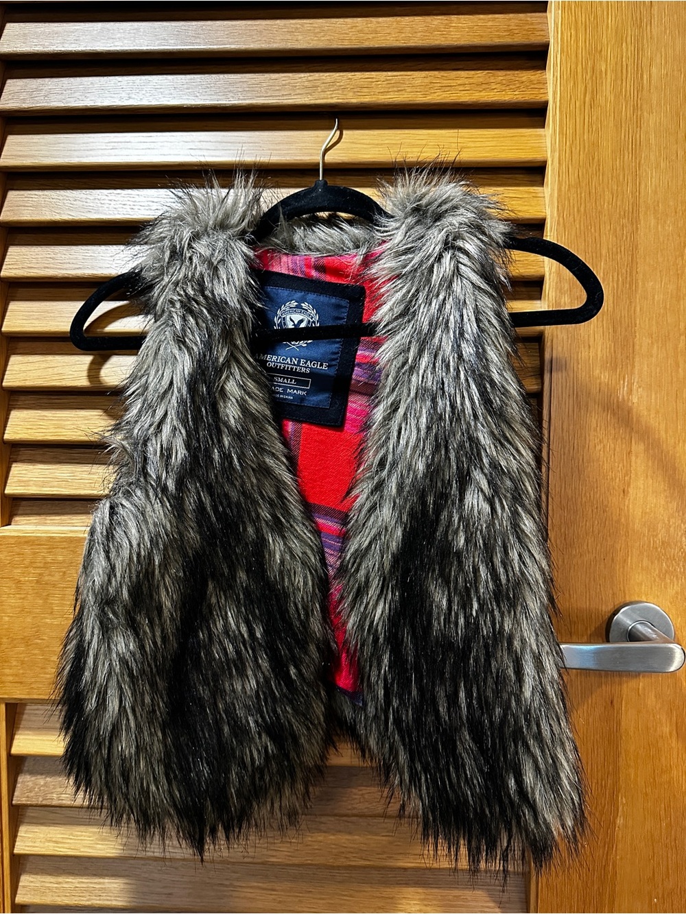 American Eagle Outfitters Faux Fur Vest with Red Plaid Lining